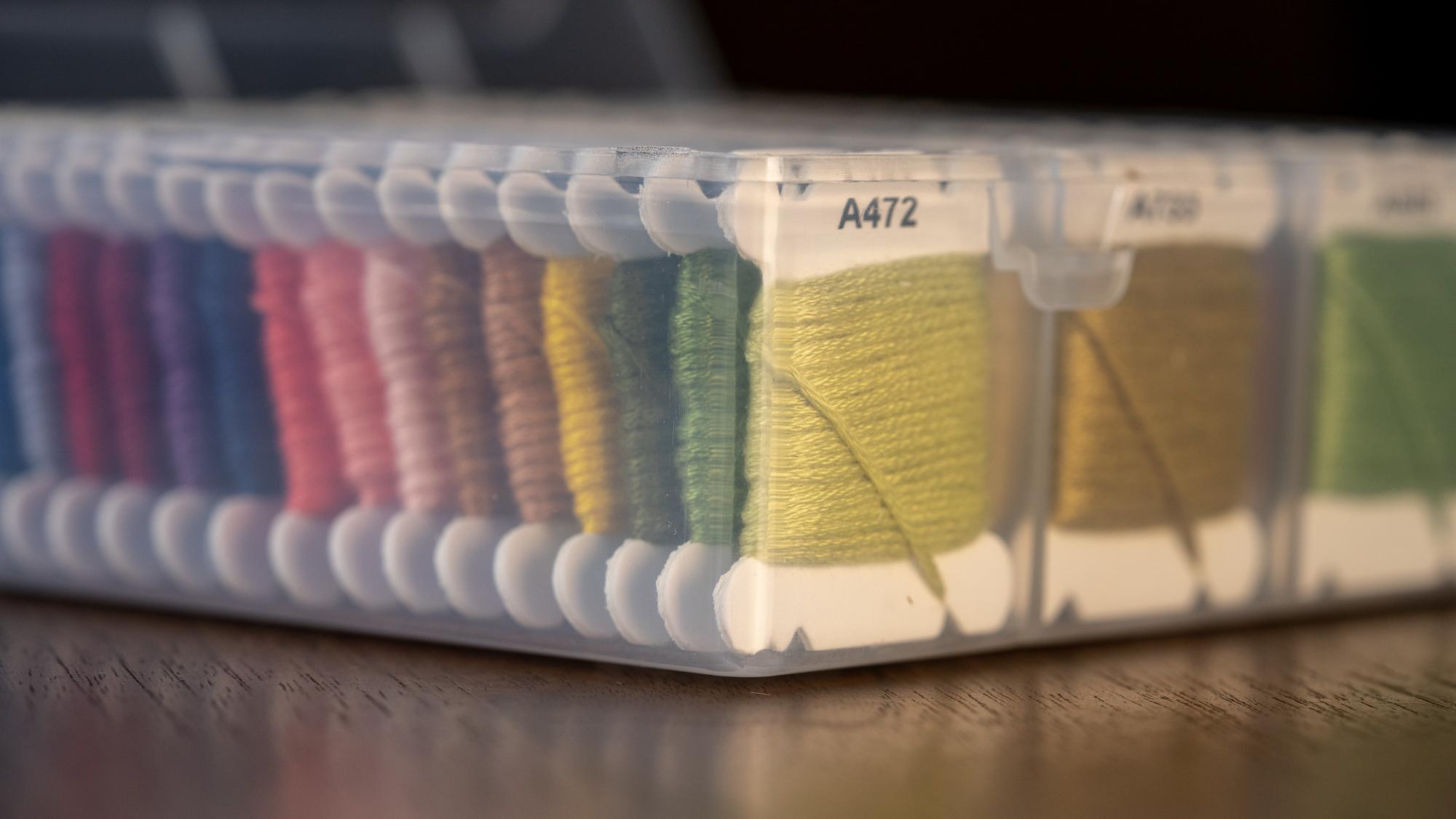 Workshop bench with tools and fabric samples